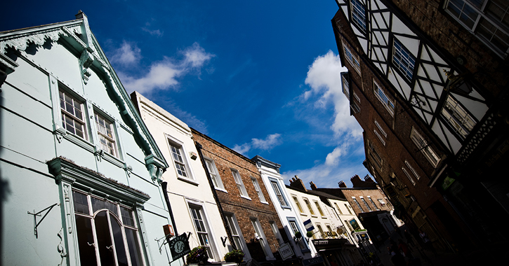 looking up at the different historic houses on the streets of Durham City